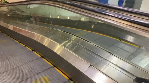 The view of a escalator elevator at local supermarket Stock Footage 253750447