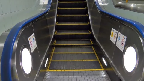 The view of the escalator moving up the upper floor in Tokyo Japan Stock Footage 123552865