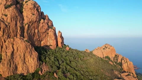 View of Esterel Mountains red cliffs overlooking the Mediterranean Sea Stock Footage 319549417