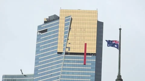 View of Eureka tower and waving australian flag in Melbourne, Australia Video stock 278097432