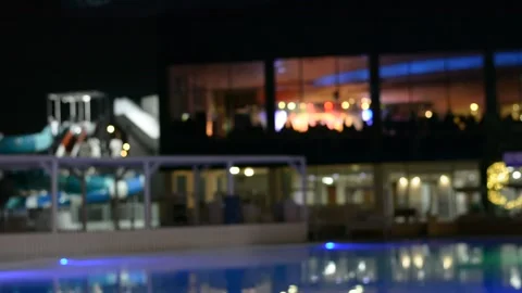 View on evening pool yard in luxury hotel. low lights 스톡 동영상 163079451