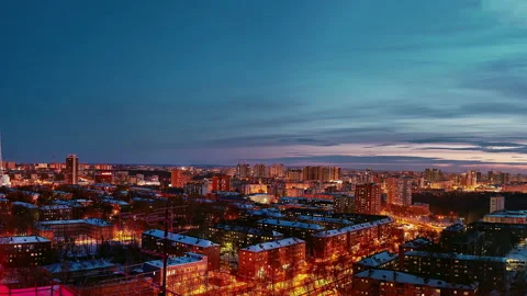 View of evening snowy city, Perm panorama from roof against backdrop of sunset. Stock Footage 160474232