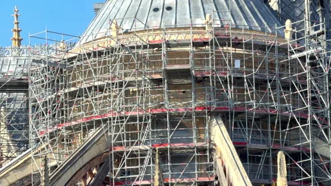 View of the extensive scaffolding surrounding the apse of Notre-Dame de Paris Stock Footage 329969720