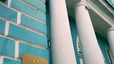 View of the facade of the building and the State flag of the Russian Federation Stock Footage 228786427