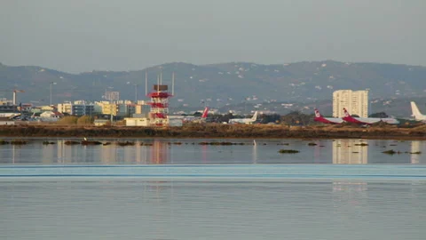 View from far across the river Ria Formosa airport Faro. Stock Footage 94813963