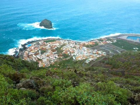 View from the far ocean and a small village Stock Photos