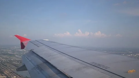 View of farm field while flying over fluffy cloud sky scape in daytime from.. Stock Footage 273211341