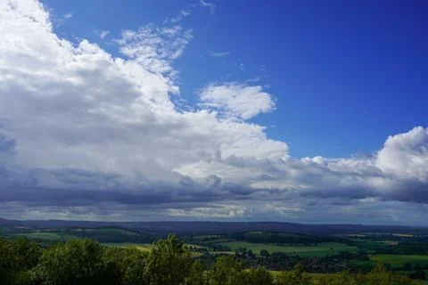 View of farm fields and clouds in the countryside 库存照片