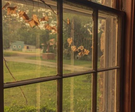 View of a farm through an old window Stock Photos