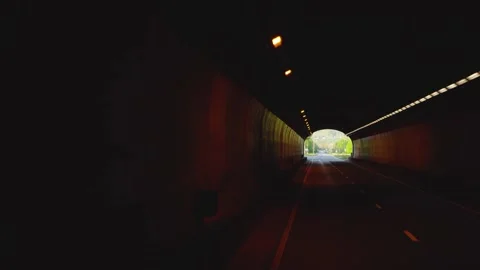 View of fast driving car in a dark tunnel with lights 4K general view copy space Stock Footage 156511916