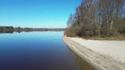 View of fast flying drone on a beautiful lake in Germany sunny weather Stock Footage 345757788