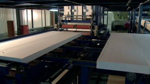 View of feeder moves finished sandwich panels Stock Footage 57598853