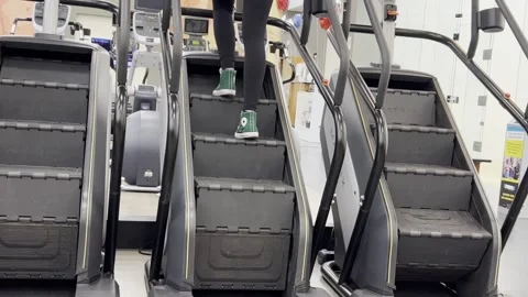 View on Feet Workout Exercising On Climber Machine Stock Footage 241109157