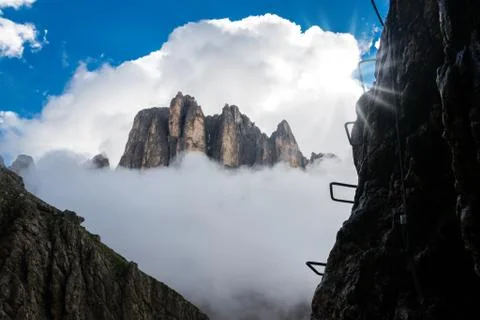 View of a via ferrata with mountains in background Stock Photos
