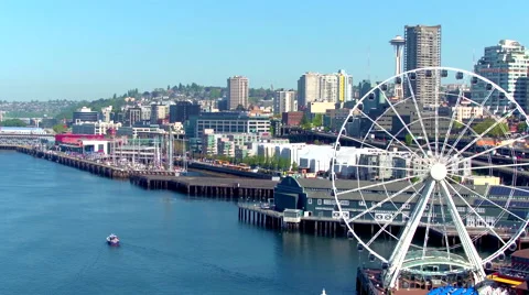 View of Ferris Wheel in Front of Seattle Skyline by Aerial Drone Stock Footage 65045028