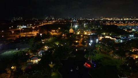 View from Ferris wheel in a night park. entertainment in the park Vídeos de archivo 93684203