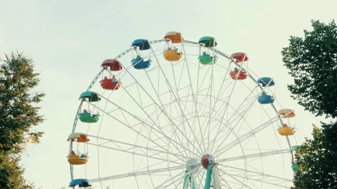 View of a ferris wheel over blue sky Stock Footage 140639909