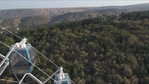 View of the ferris wheel in the park Mtatsminda in Tbilisi. Stock Footage 106001471