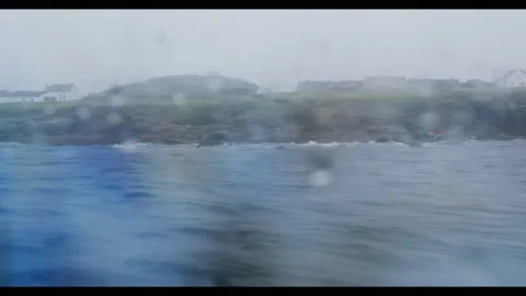 View Of Ferry Boat Though Window  Approaching Arranmore Island 動画素材 206792122