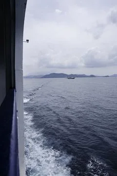 View of the ferry crossing the ocean Stock Photos