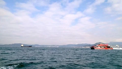 View from the ferry heading towards Victoria Harbour, Central, Hong Kong Stock Footage 102812468