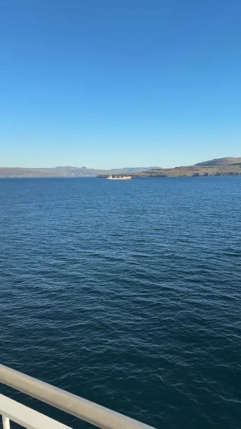 View from a ferry over the North Atlantic near the Faroe Islands.  Stock Footage 310947734