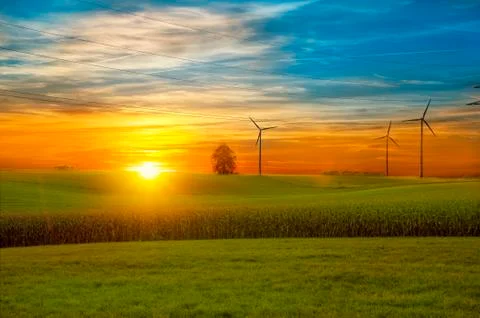 View of the field in Germany with a wind farm Stock Photos