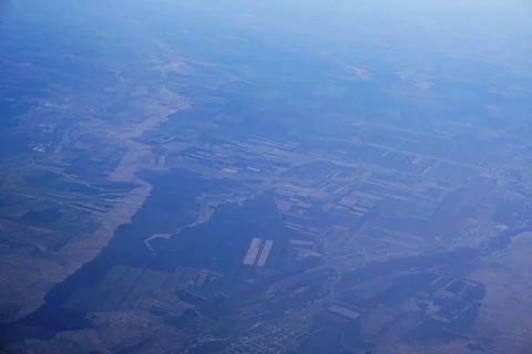 View of fields from the airplane Stock Photos
