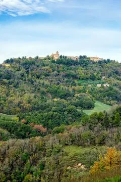 View of fields and woods under Belvedere Fogliense, Region Marche of Italy. Фото