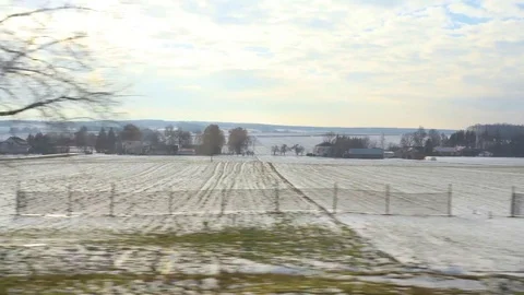 View fields in winter from window passanger Stock Footage