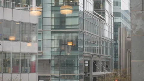 A view of a financial district from inside an office. Stock Footage 168617476