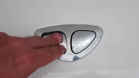 View of finger pushing button and flushing toilet. Stock Footage 282907197