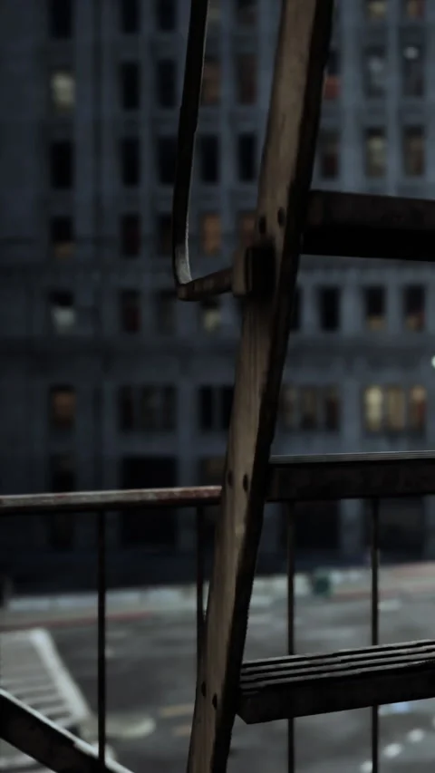 View from a fire escape at dusk in an urban area with buildings in sight Stock Footage 340645320