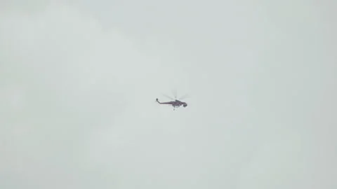 View of a firefighting helicopter flying on the sky Stock Footage 155961491