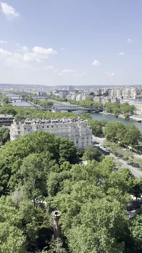 View from first floor of Eiffel Tower overlooking Paris, France in spring Stock Footage 337196730