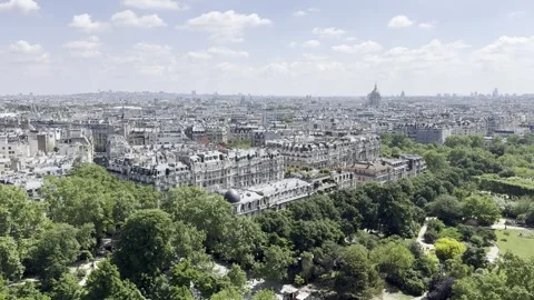 View from first floor of Eiffel Tower overlooking Paris, France in spring Stock Footage 337196743