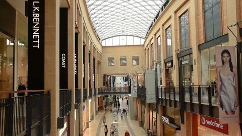 View from the first floor of the Grand Arcade with shops and shoppers below Stock Footage 97137458