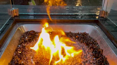View of the flame of fire in the place to warm the customers of the street cafe. Stock Footage 166275093