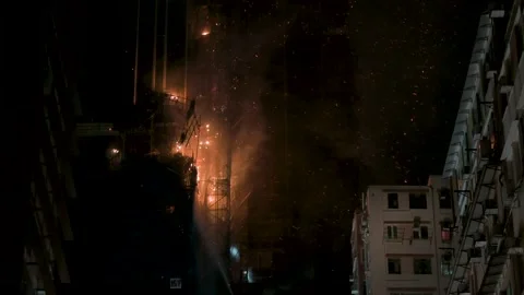 View of flames of a fire incident affecting a skyscraper office building Stock Footage 237061096