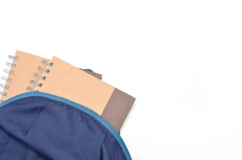 View of flat lay with school backpack and stationery with space for text on w Stock Photos