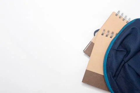 View of flat lay with school backpack and stationery with space for text on w Stock Photos