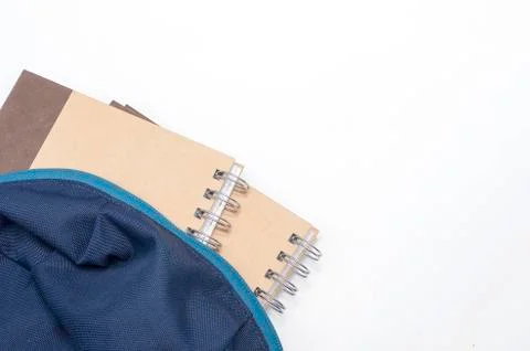 View of flat lay with school backpack and stationery with space for text on w Stock Photos