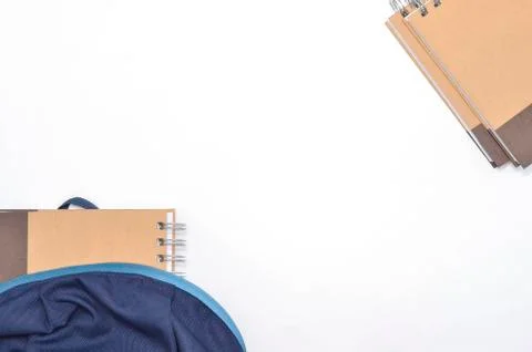 View of flat lay with school backpack and stationery with space for text on w Stock Photos