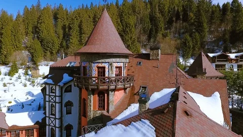 View flight over ski resort village in winter sunset time valley mountains snow 스톡 동영상 105267966