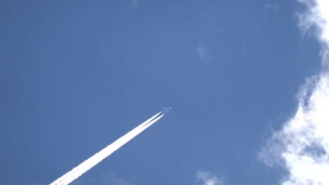 View of the flight of the plane from the surface of the earth Stock Footage 278469060