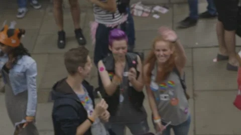 VIEW FROM THE FLOAT AS CROWDS WAVE DURING LONDON GAY PRIDE PARADE Stock Footage 130744347