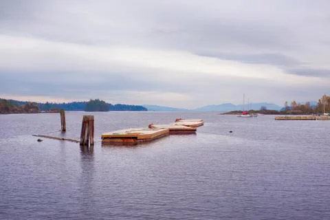 View of floating deck in Oyster Bay, town of Ladysmith, BC, with the Canadian Stock Photos