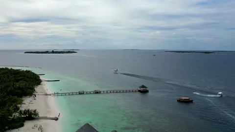 A View Of Floatplane Flying Near Resorts Of Maldives Island In South Asia Stock Footage 296160925