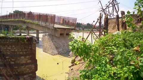 View of flood hit areas with broken bridge in Dehradun India Stock Footage 321042109