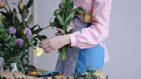 View of florist arranging different flowers Stock Footage 86535103